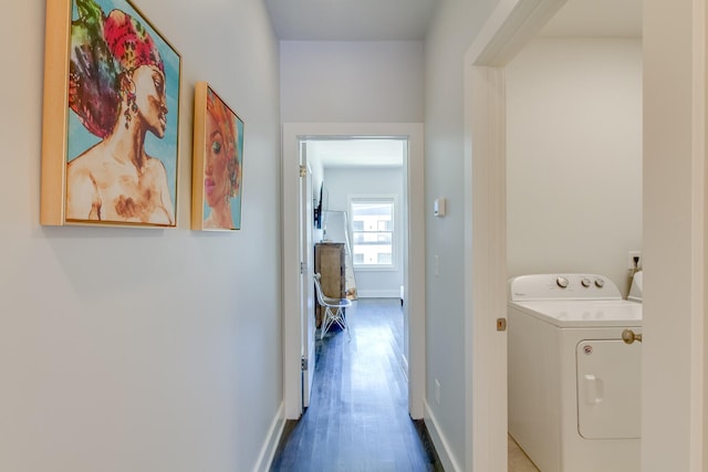 corridor with washer / clothes dryer and wood-type flooring