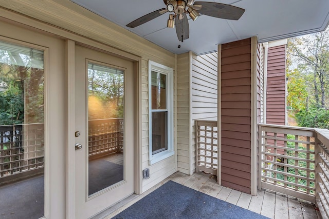 exterior space featuring ceiling fan