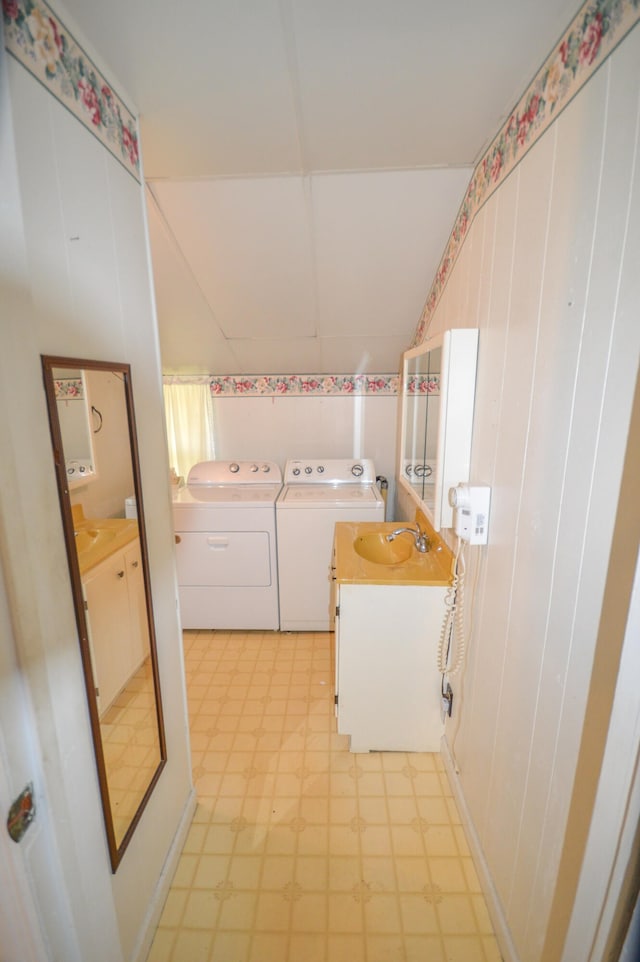 laundry area with sink and washer and clothes dryer