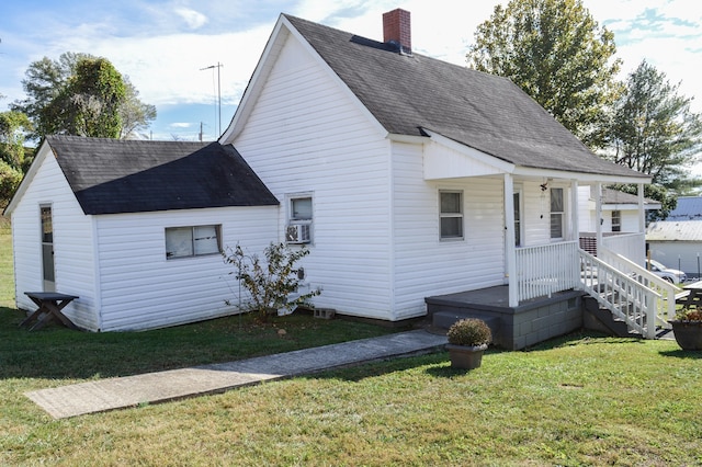 exterior space with cooling unit and a front lawn