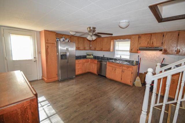 kitchen with ceiling fan, appliances with stainless steel finishes, sink, and dark hardwood / wood-style floors