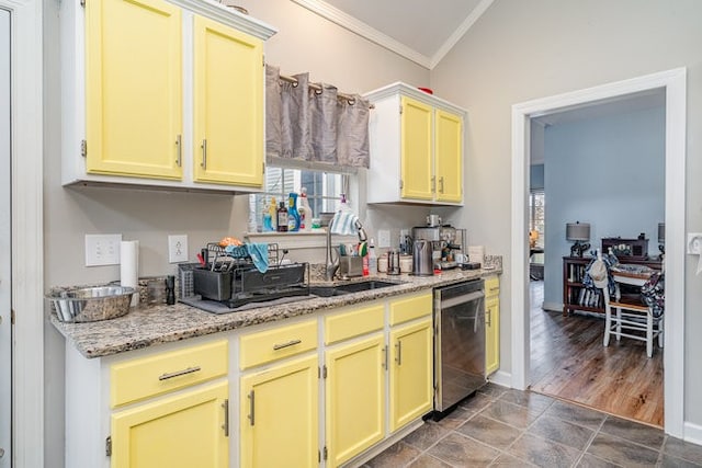 kitchen featuring light stone counters, ornamental molding, dark wood-type flooring, stainless steel dishwasher, and lofted ceiling