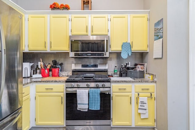 kitchen featuring decorative backsplash and stainless steel appliances