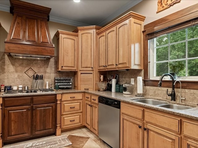 kitchen with tasteful backsplash, crown molding, appliances with stainless steel finishes, light stone countertops, and sink