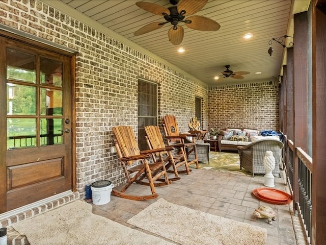 view of patio / terrace with an outdoor hangout area and ceiling fan