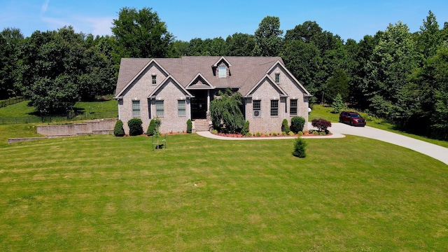 view of front of property with a front lawn