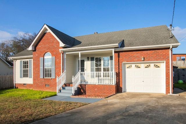 view of front of property featuring covered porch, a garage, and a front yard