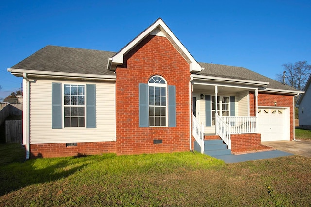 view of front of property with a front yard, a porch, and a garage