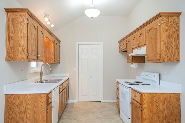 kitchen featuring lofted ceiling, white appliances, sink, and hanging light fixtures