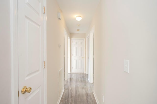 hallway featuring light hardwood / wood-style floors