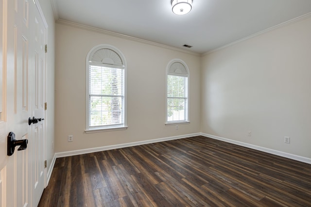 unfurnished room with dark hardwood / wood-style flooring and ornamental molding