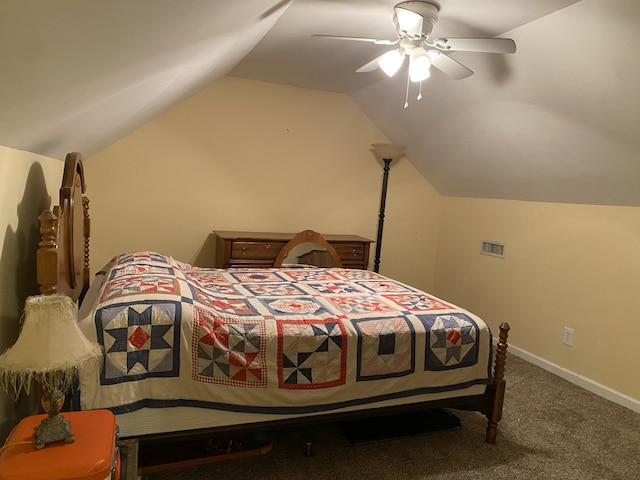 bedroom with vaulted ceiling, carpet flooring, and ceiling fan