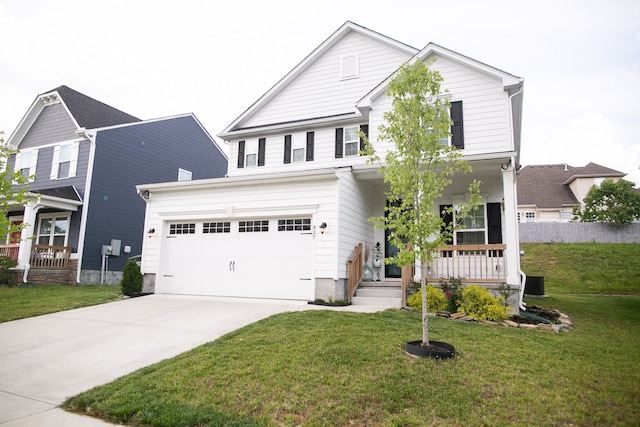 view of property featuring a front lawn and covered porch