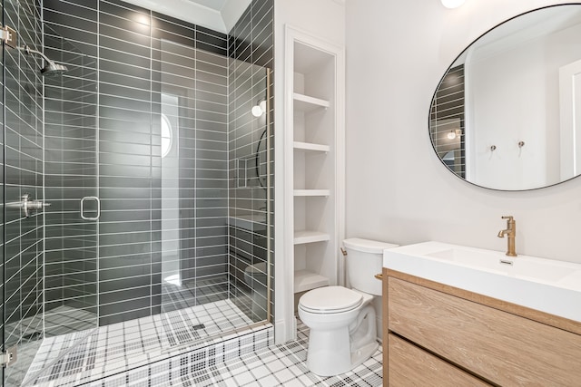 full bath featuring toilet, tile patterned flooring, vanity, a shower stall, and built in shelves