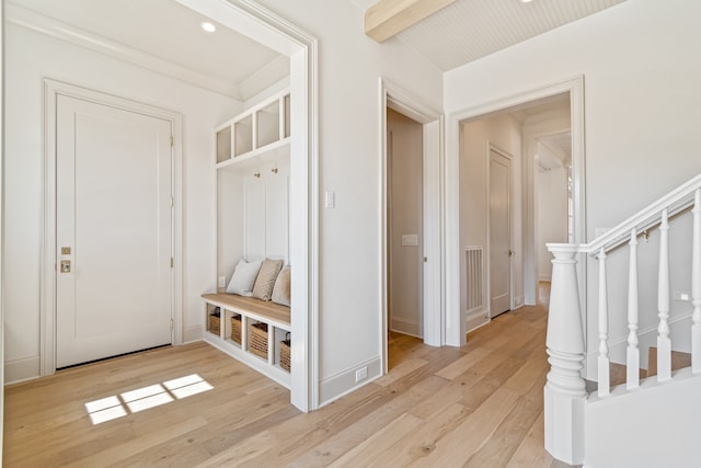 mudroom featuring light wood-style flooring and visible vents