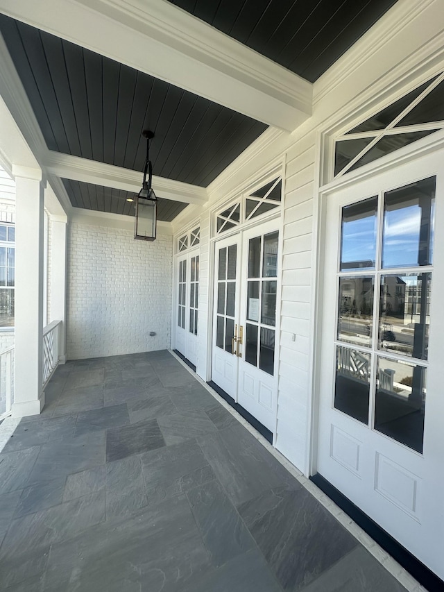 balcony featuring french doors