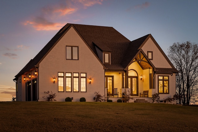 view of front of house with a yard