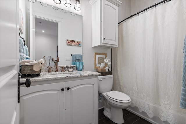 bathroom with tile patterned flooring, vanity, toilet, and a shower with curtain