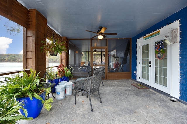 view of patio featuring french doors and ceiling fan