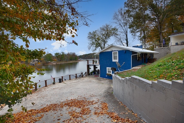 dock area featuring a water view