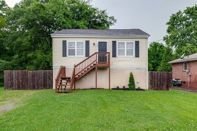 view of front of home with a front yard