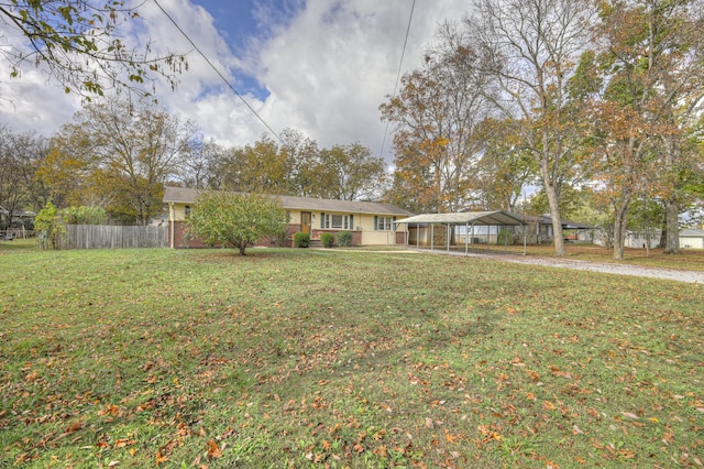 ranch-style house featuring a front yard