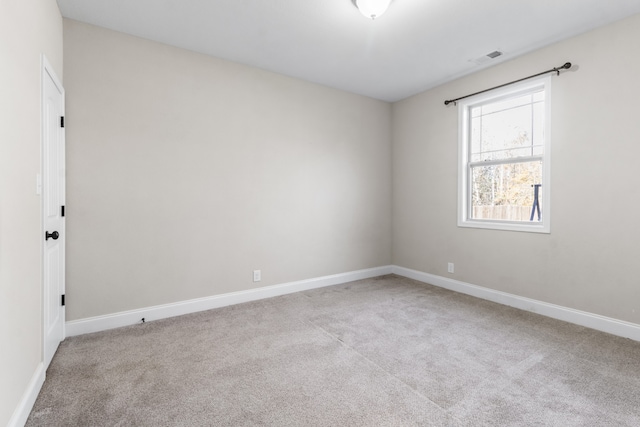 view of carpeted spare room