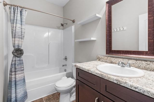 full bathroom featuring tile patterned flooring, shower / tub combo with curtain, vanity, and toilet