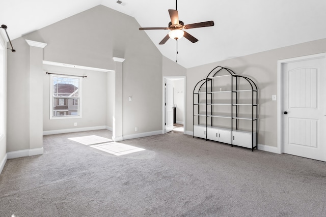 unfurnished living room with light carpet, high vaulted ceiling, and ceiling fan