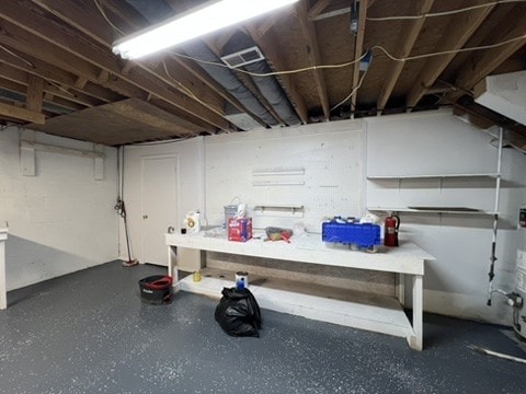 basement featuring a workshop area