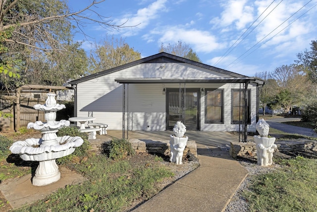 exterior space featuring a sunroom