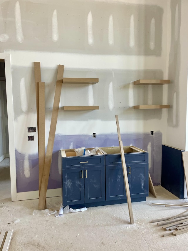 kitchen with blue cabinetry