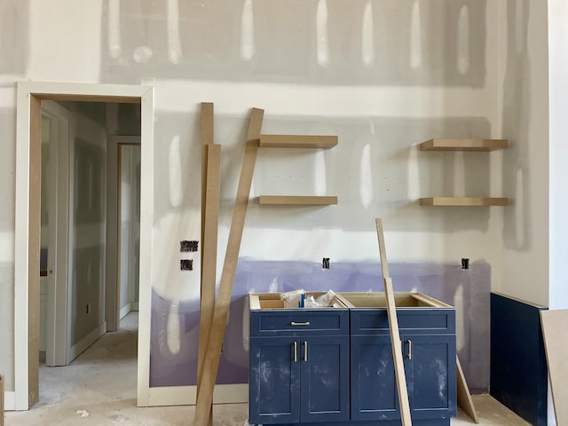 kitchen featuring blue cabinetry