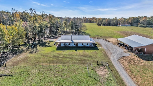 birds eye view of property featuring a rural view