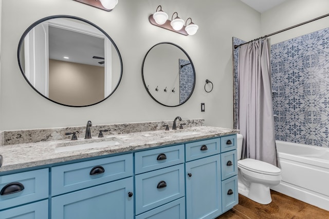 full bathroom with vanity, toilet, hardwood / wood-style flooring, and shower / bathtub combination with curtain