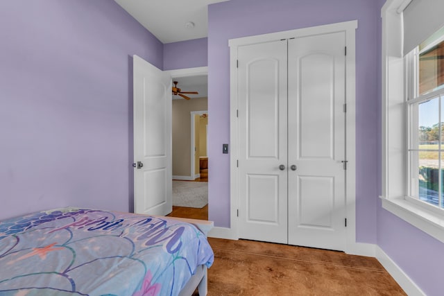 carpeted bedroom with a closet