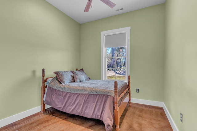 bedroom featuring ceiling fan and light colored carpet