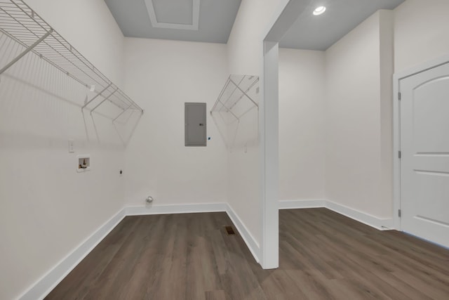 laundry area with dark hardwood / wood-style flooring, washer hookup, and electric panel