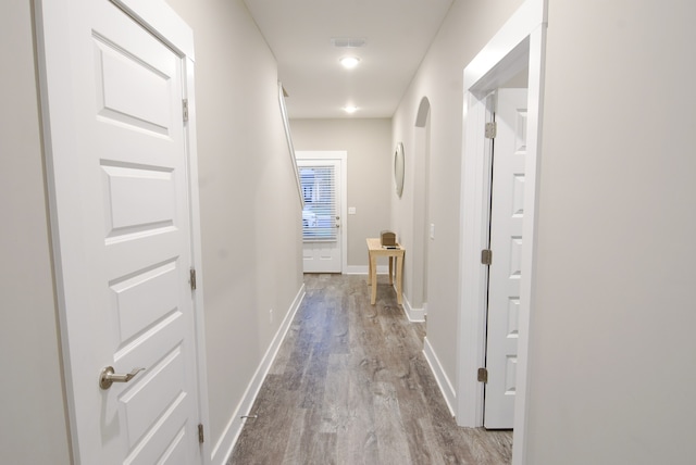 hallway featuring light wood-type flooring