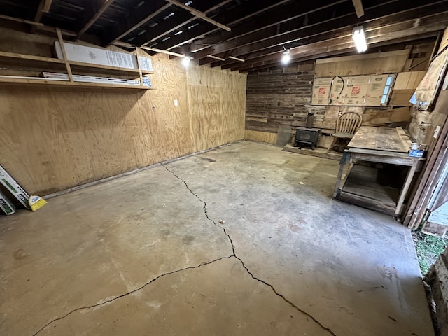 basement featuring a wood stove