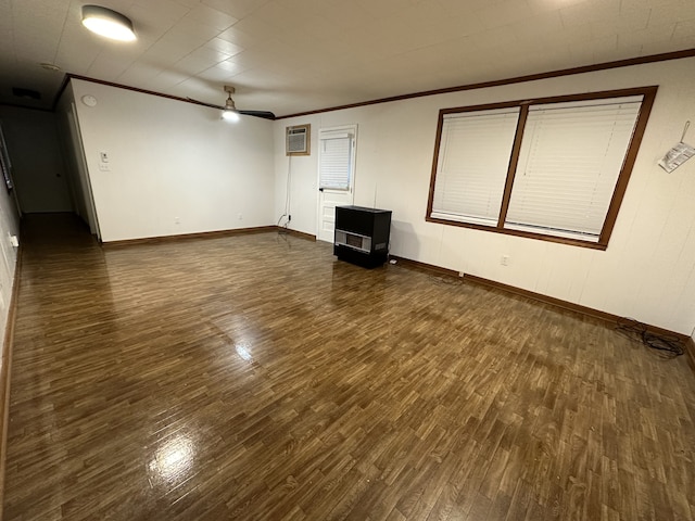 unfurnished living room featuring dark wood-type flooring, ceiling fan, crown molding, and a wall mounted air conditioner