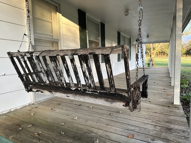 wooden terrace featuring a porch