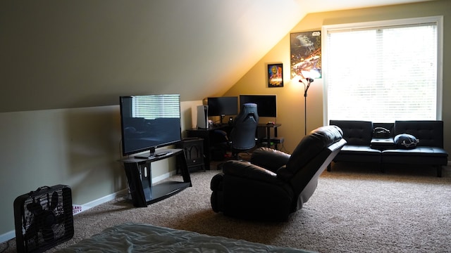 living room featuring vaulted ceiling and carpet floors