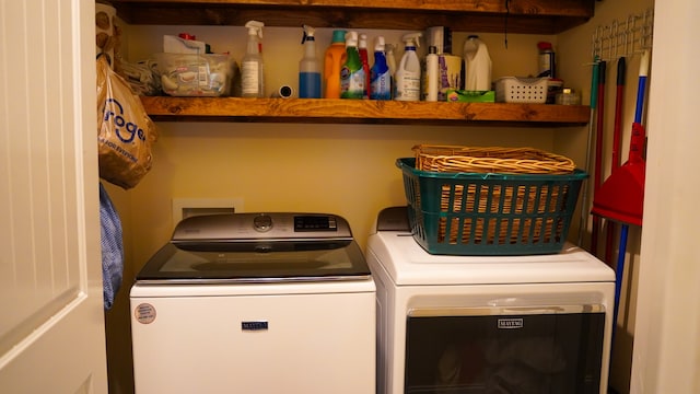 washroom featuring independent washer and dryer