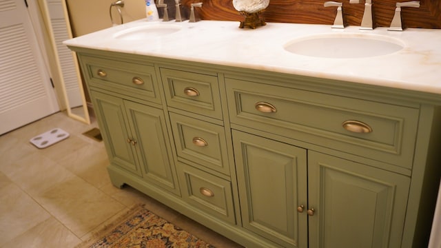 bathroom featuring vanity and tile patterned flooring