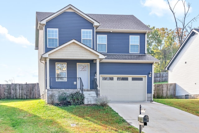 view of front of house with a garage and a front lawn