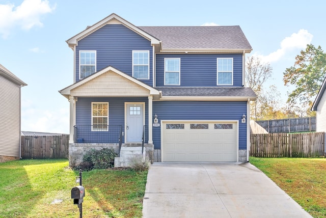 view of front of property with a garage and a front yard