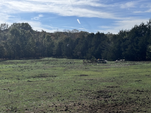 exterior space with a rural view