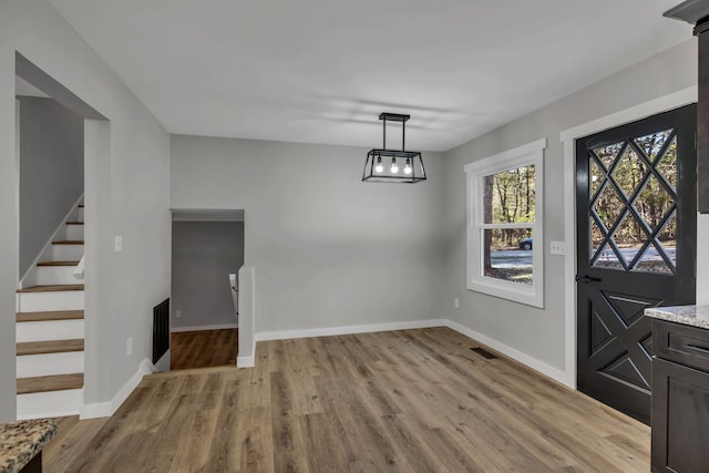 foyer entrance featuring light wood-type flooring