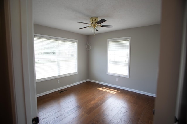 1805 Pointe Ct, Lebanon, TN 37087 - unfurnished room with baseboards, ceiling fan, dark wood-style flooring, and a textured ceiling